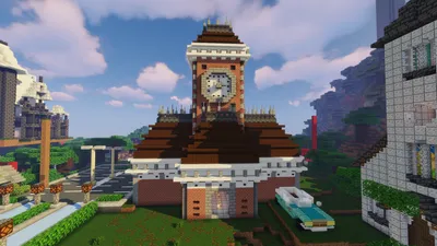 Здание вокзала с часовой башней из красного кирпича в Minecraft
